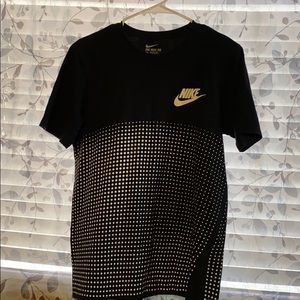 Men’s black Nike shirt with white dots.